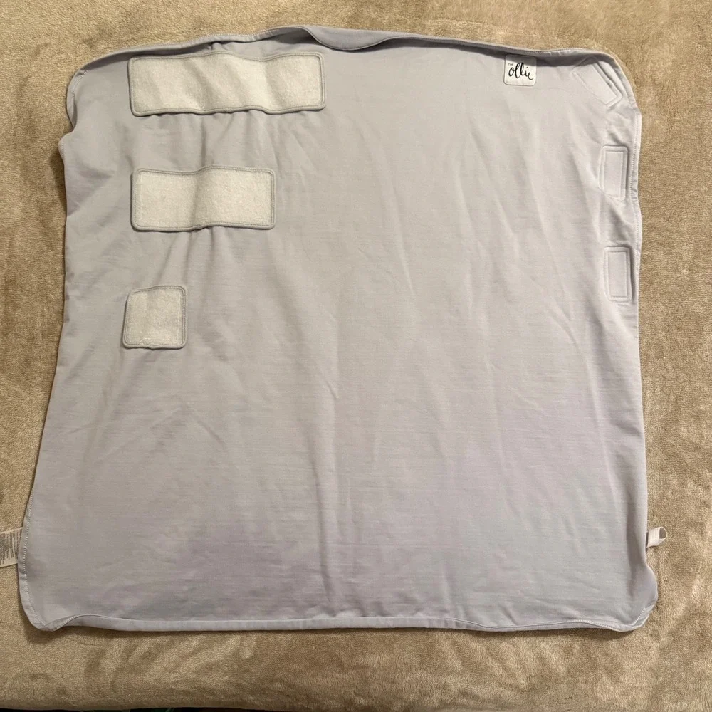 The Ollie Swaddle Smarter Swaddle Lavender Adjustable Baby Wrap